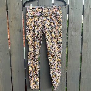 FREE PEOPLE ; multi colored flowered leggings
